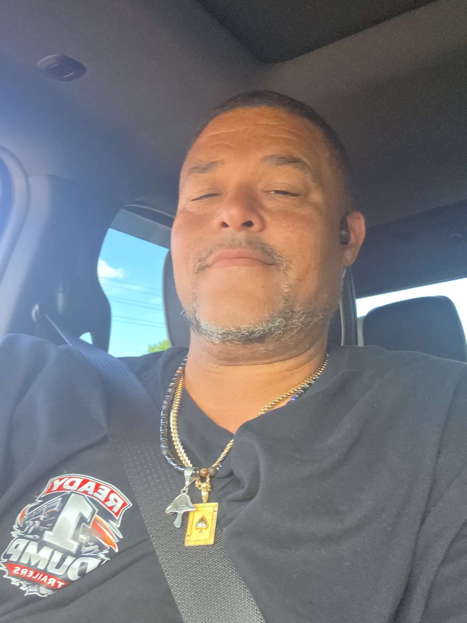 Ben Thomas, owner of Ready 1 Dump Trailers, wearing a Ready 1 Dump branded shirt